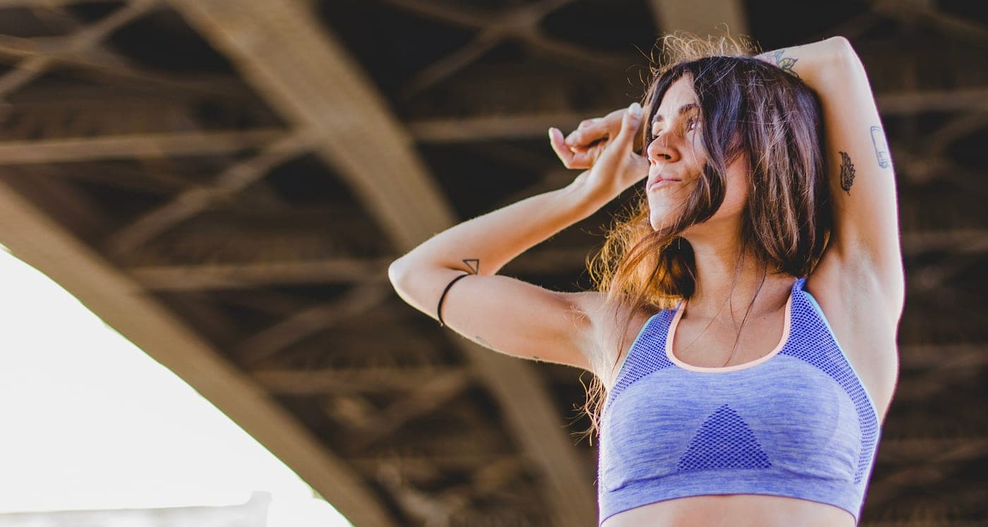 Woman stretching outdoors